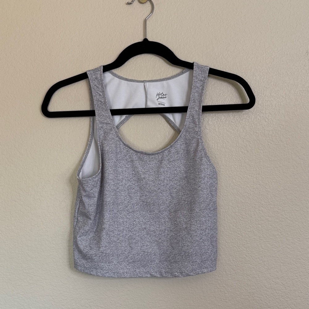 Kortni Jeane grey swim top women’s medium EUC
